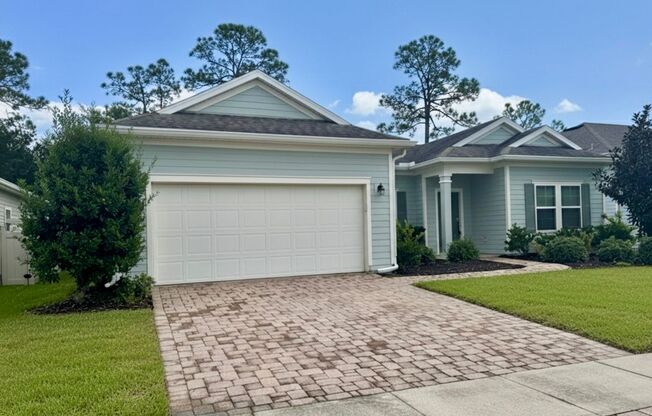 Modern 4 Bed 2 Bath Home. Double Garage. Screened in Lanai. Bonus Room. Minutes from World Golf Village!