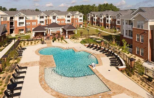 Pool with chairs and sun shelf