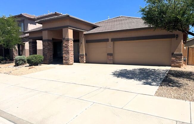 4 BEDROOM HOME IN LITCHFIELD MANOR WITH 3 CAR GARAGE
