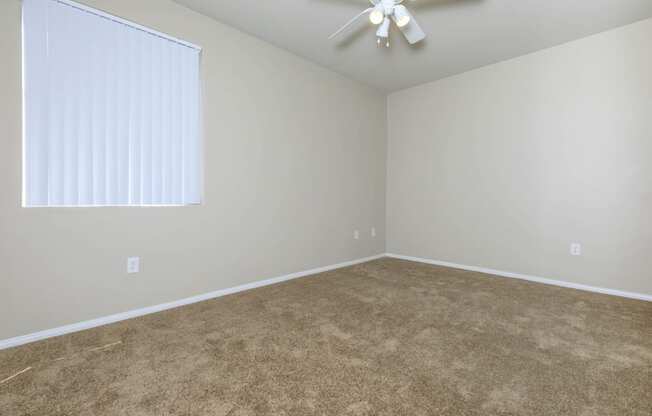 Unfurnished room area and wooden floor at The Covington by Picerne, Nevada