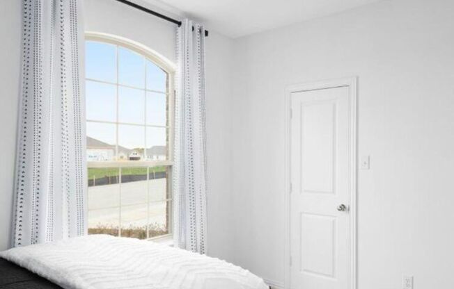This new single-story home features a smart layout that is perfect for growing families.