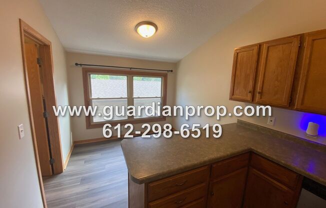 Updated Townhouse Available December 1st, Open Floor Plan, Large Deck/Patio, Two Car Garage