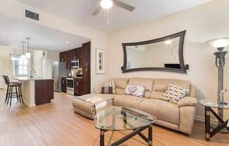 Living Room With Kitchen View at The Dakota, Jupiter, FL