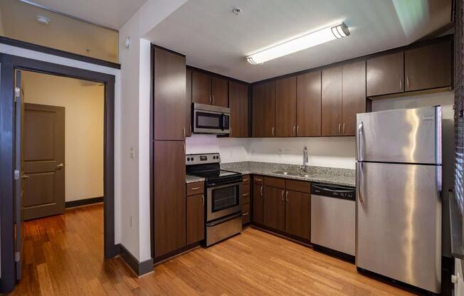 Dark cabinets in Kitchen at The Masonry Apartments