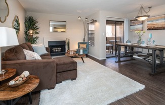 Living area with fireplace and dining area