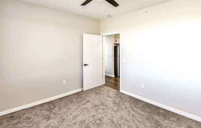 Studio, one two and three bedroom apartments and townhomes featuring open concept floor plans, dens, large windows, stainless steel appliances, quartz countertops, eat-in kitchens, pantries, LVT flooring and much more at The Trails at North Streams in Omaha, NE