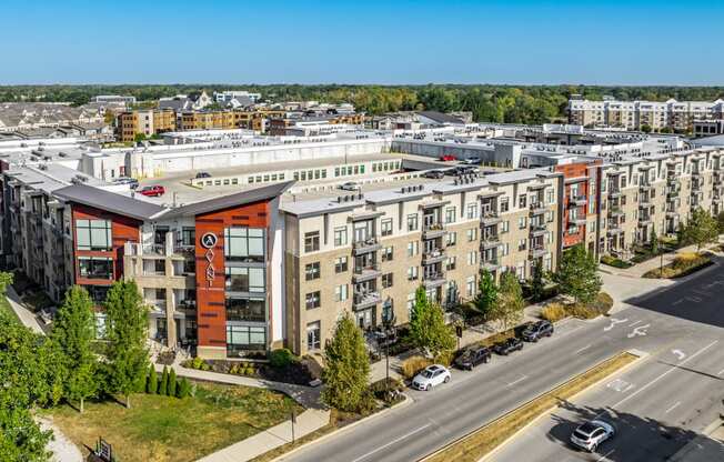 an aerial view of an apartment building in a city