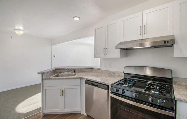 A kitchen with stainless steel appliances at West Hampton Park Apartments in Elkhorn, NE 68022