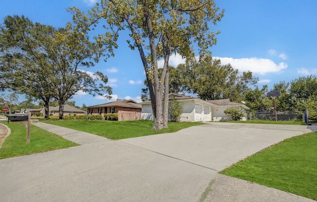 Charming white brick home with lots of upgrades nestled in the desirable neighborhood