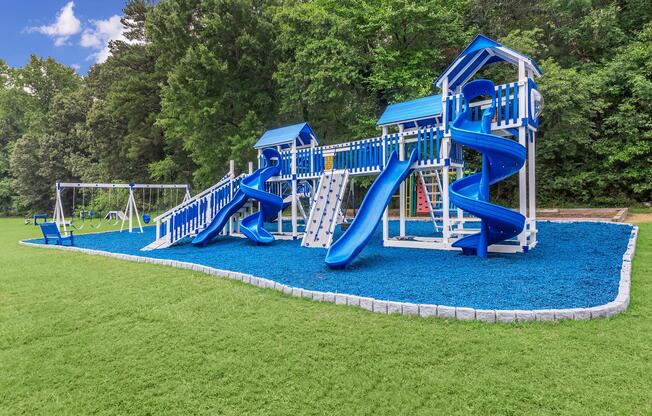 a playground with a blue toy