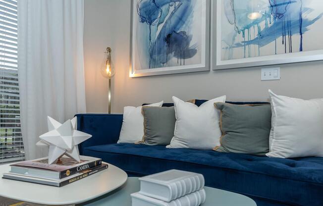 a bedroom with a bed and desk in a room