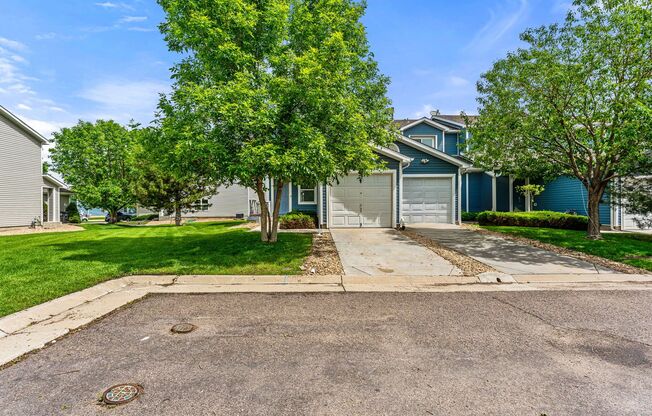 End-unit townhome in Cherry Creek School District with private yard