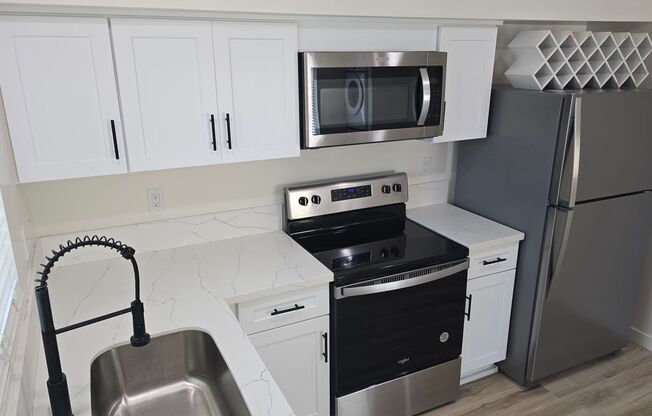 Welcome Surf House Villas E, a newly renovated luxury apartment community in the heart of Pacific Beach, San Diego.