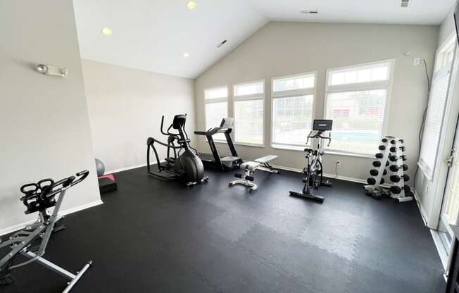the gym is fully equipped with cardio equipment and weights at Traditions at Slate Ridge, Ohio, 43068