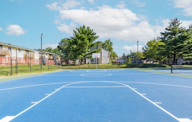 Outdoor basketball court at Woodbridge Apartments Bloomington