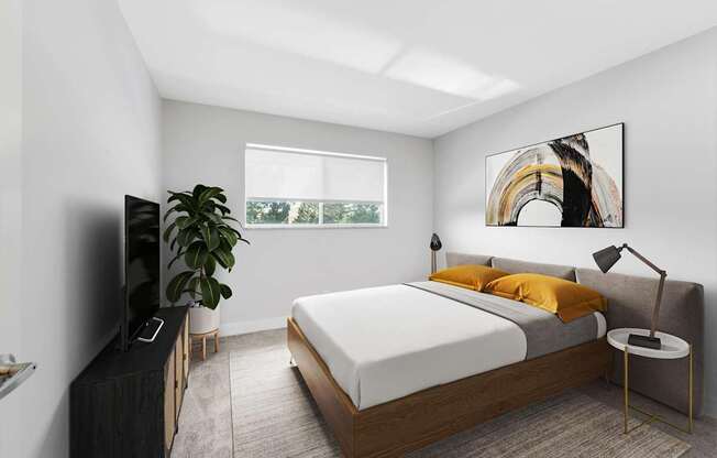 A modern bedroom with a large bed and a flat screen TV.