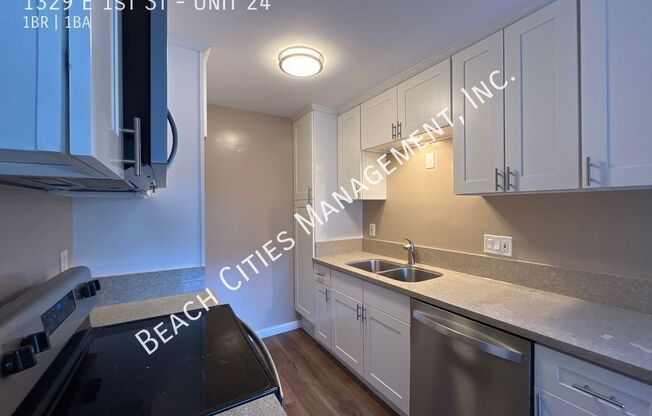 1329 E 1 ST