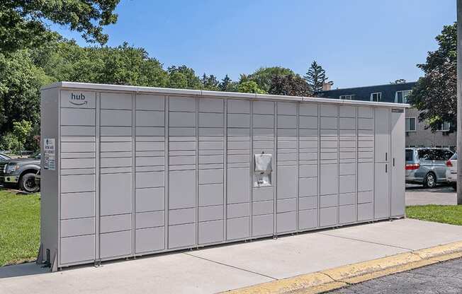 a large metal building with a sign on the side of it