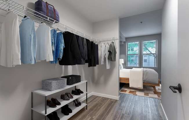 a walk in closet in a 555 waverly unit