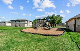 Affordable Apartments in Austin, TX for Rent – Huntington Meadows- a playground with a swing set
