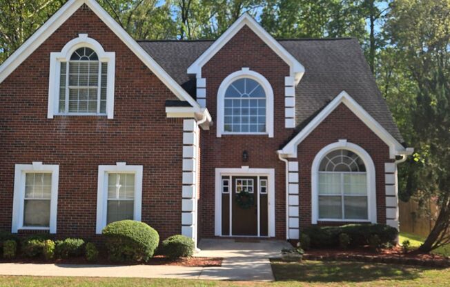 Stately brick home with master on main!