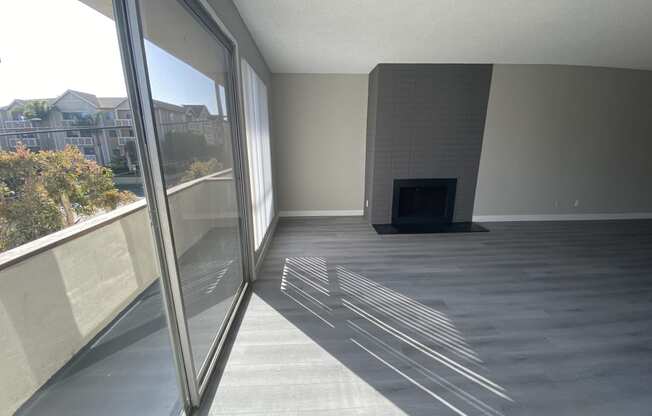 11858 Goshen Ave Unit 207 living room with fireplace and view