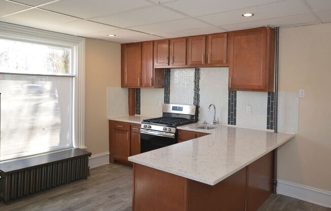 Spacious 1bed/1bath on main floor of with tons of windows! - Ask about our no security deposit option!