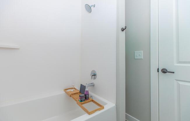 a room with a sink and a shower