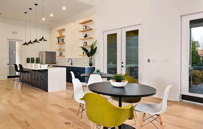 a kitchen and dining area with a table and chairs at Sovereign at Overland Park, Overland Park, 66213  