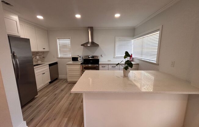 Updated 3BR in Jacksonville Beach! Spacious Fenced Yard & Lawn Care Included!