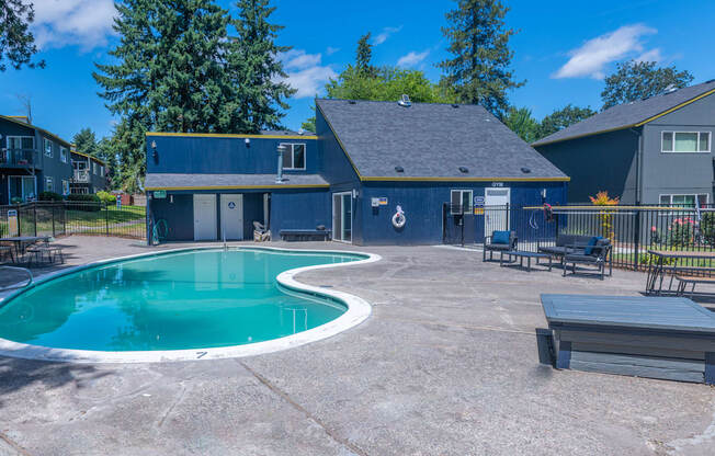 take a dip in the pool at the whispering winds apartments in pearland, tx