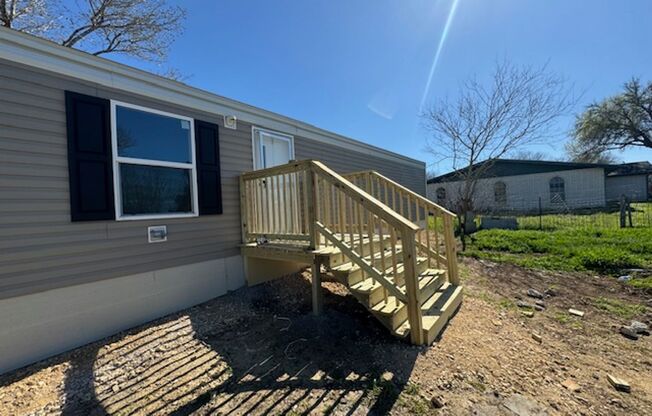 Move in June 10th 2025!! Beautiful 3 bedroom 2 bath w/Over 1/2 an acre