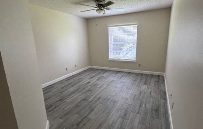 Second floor, 2/2 unit with wooded view near UCF