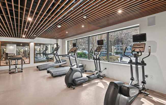 Renovated Fitness Center with treadmills and elliptical machines.