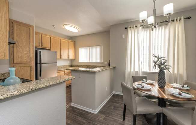 Dining Room and Kitchen View at Atwood Apartments, California, 95610