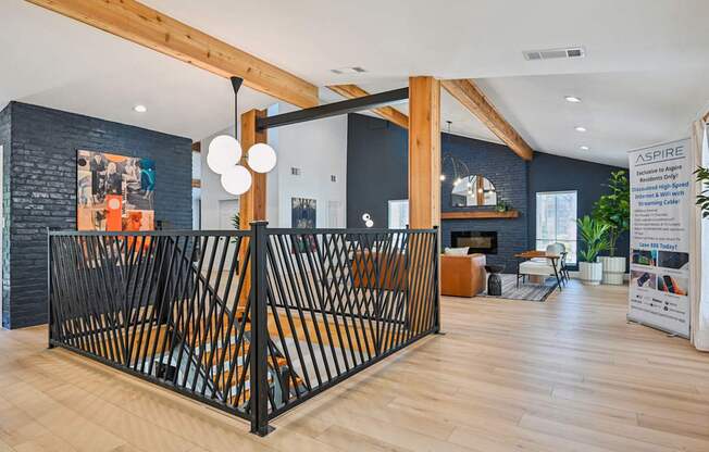 A large open space with a black gate in the middle.