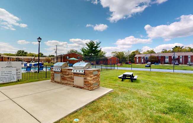 the preserve at ballantyne commons community picnic area with grill and grass