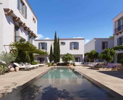 a swimming pool in the middle of a courtyard