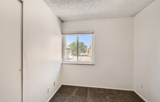 bedroom with window at mesa gardens