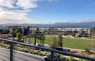 Spectacular Views in This Spacious 1 Bed/1.5 Bath with Den Home on Communications Hill