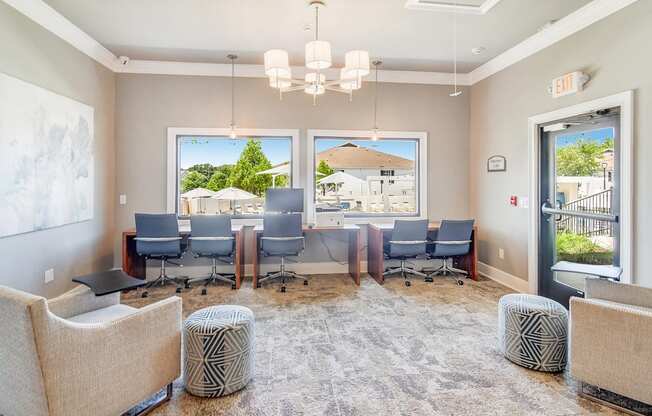 a conference room with a table and chairs and a window