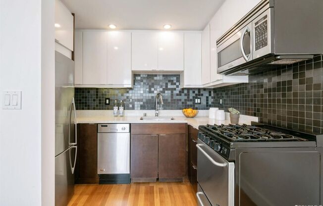 Contemporary 2BD/2BA Condo with parking and natural light