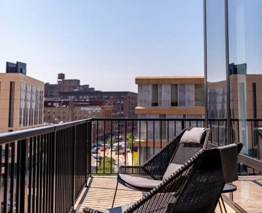 365 Nicollet Apartment Balcony with city background
