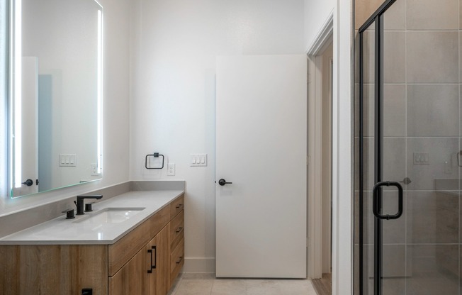 Indulge in luxury every day at Modera Trinity. Designer bathrooms featuring sleek quartz countertops offer a contemporary touch of elegance, creating a spa-like oasis in the comfort of your own home.