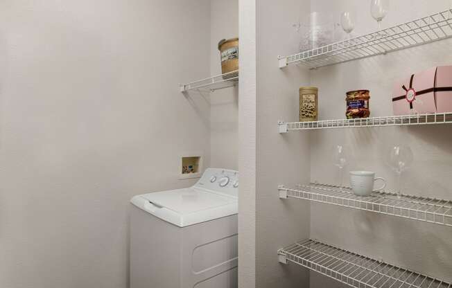 Laundry Room and Storage Area at Sandstone Creek Apartments , Overland Park, KS