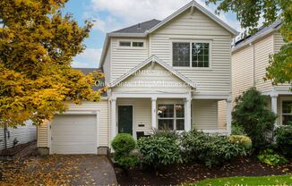 Modern Comforts: Attached Garage & Serene Backyard Deck!