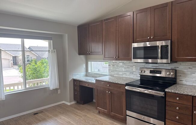 Beautiful stucco 4 bed rancher on premium fully landscaped lot