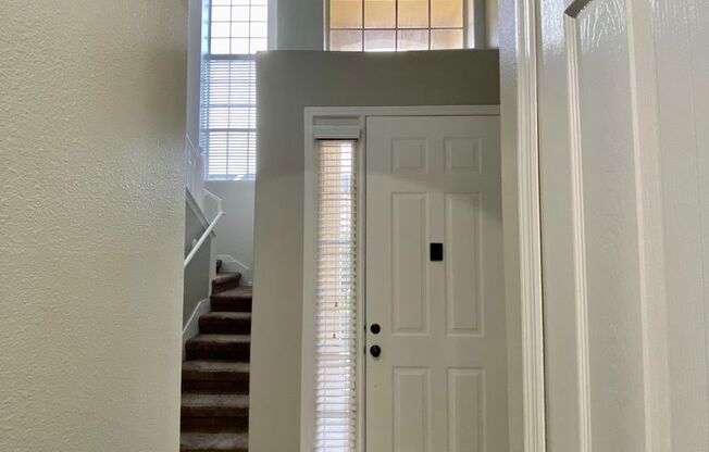 Move in September! Stunning 4 bedroom + Loft, 2.5 bath Townhome Gated community in Avalon Park. 1 car attached garage. HOA handles lawn care. Primary bedroom on 1st floor.