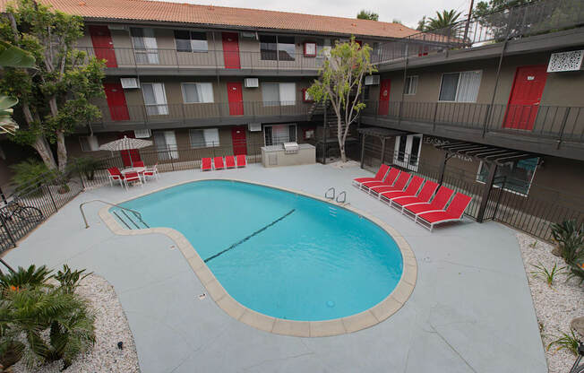 our apartments showcase an unique swimming pool at Dwell Apartment Homes, Riverside, CA