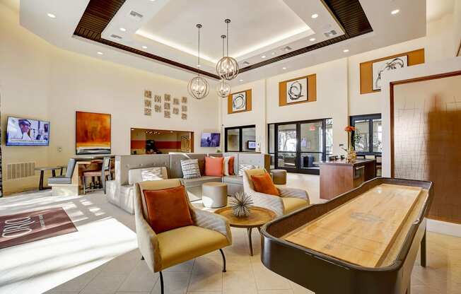 a living room with furniture and a table